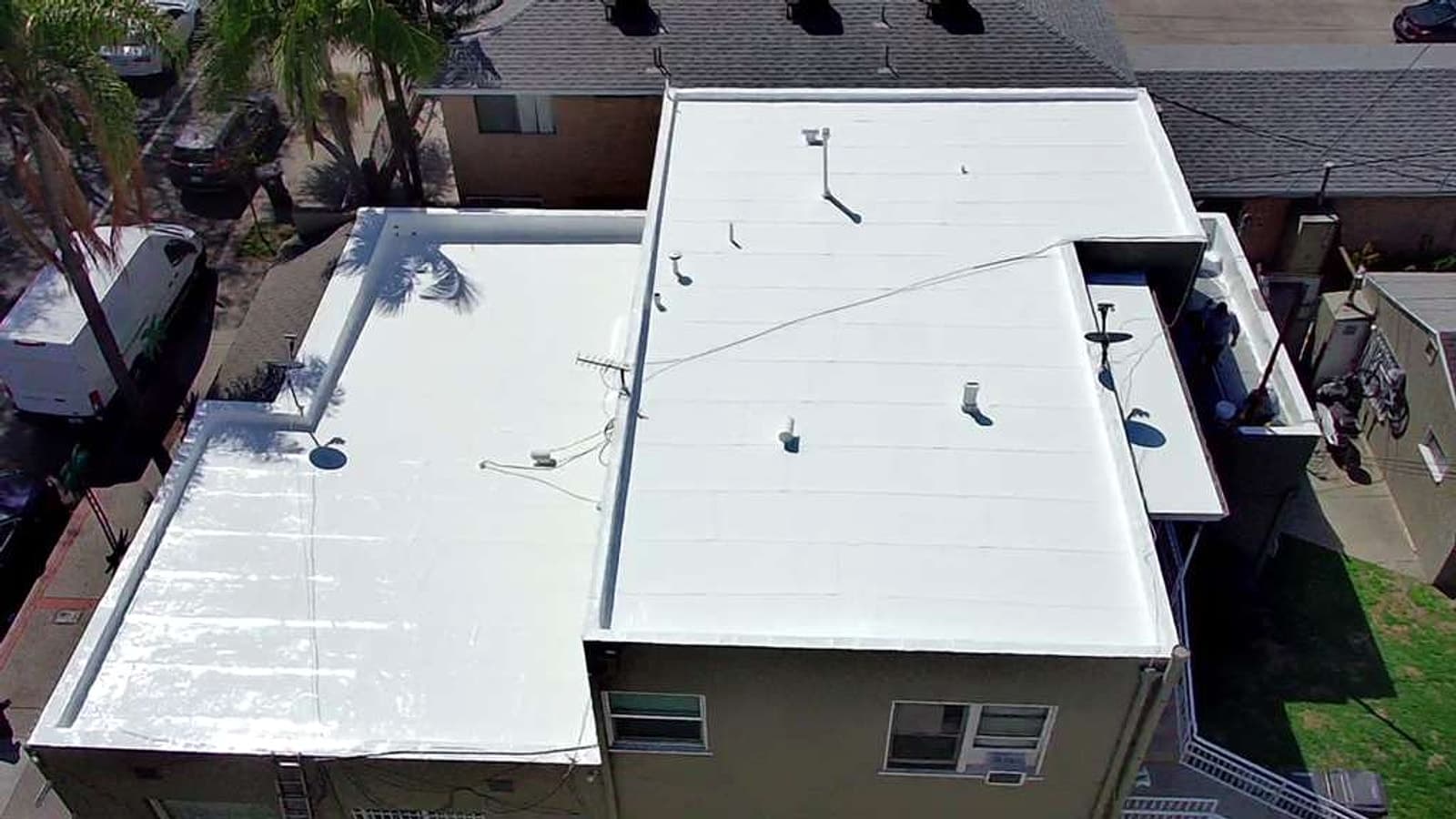Wide roofing project photo showing finished roof work