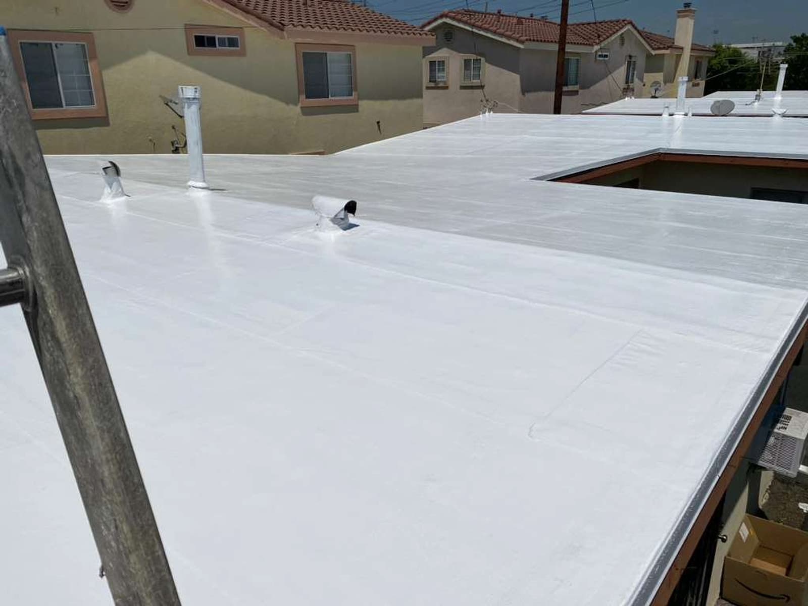 Finished residential roofing project with new roof surface